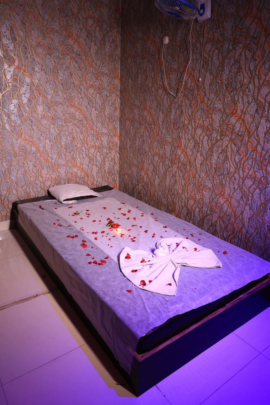 Therapy bed made up ahead of a massage session at Paradise Spa, Thane